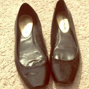 A pair of black flats